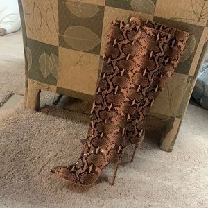 Knee high snake skin boots